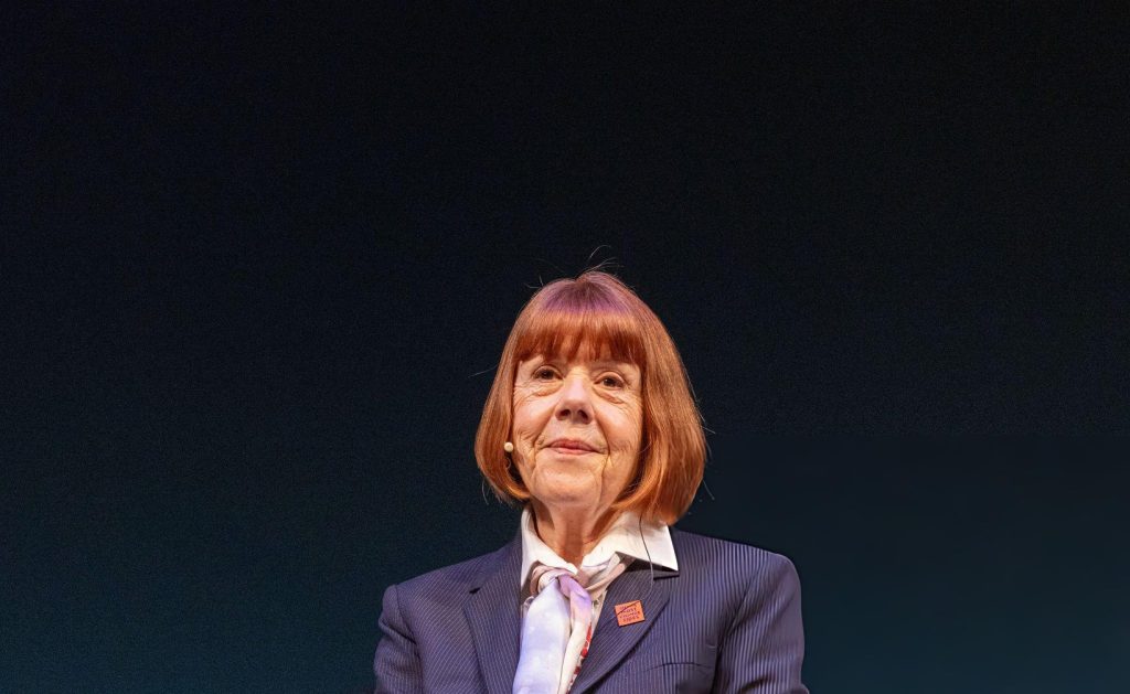Gisele Pelicot reacts on stage during a presentation of her book at the Residenztheater in Munich, southern Germany